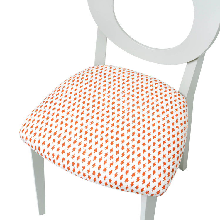 Chloe Dining Chair upholstered in Anni Orange from Penny Morrison