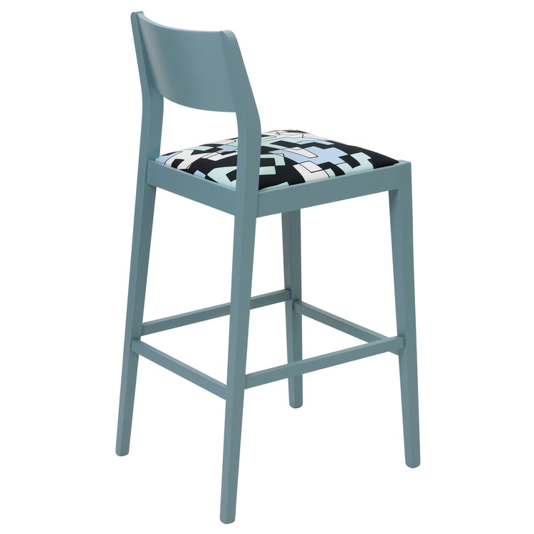 The James Bar Stool upholstered in Doodle fabric by Jon Burgerman finished in Room Blue Eggshell. 