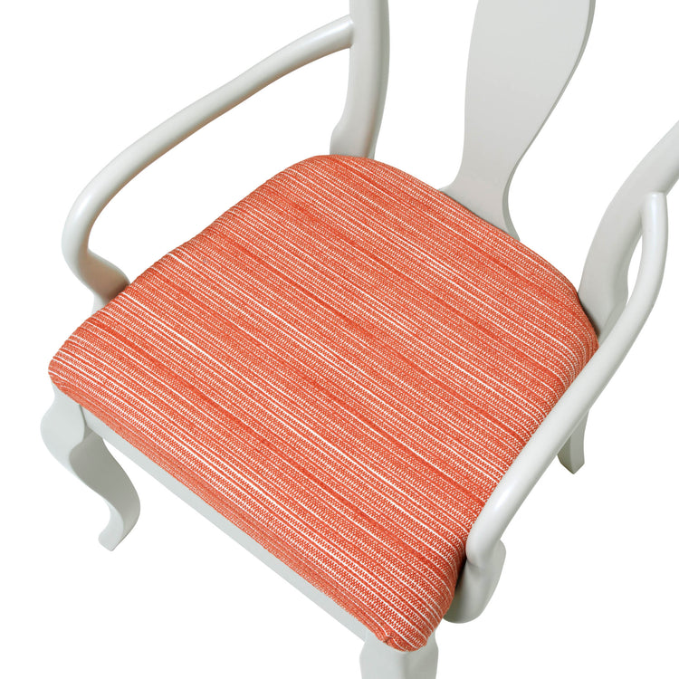 Marco Chair upholstered in Hippie in Coral from Christopher Farr Cloth