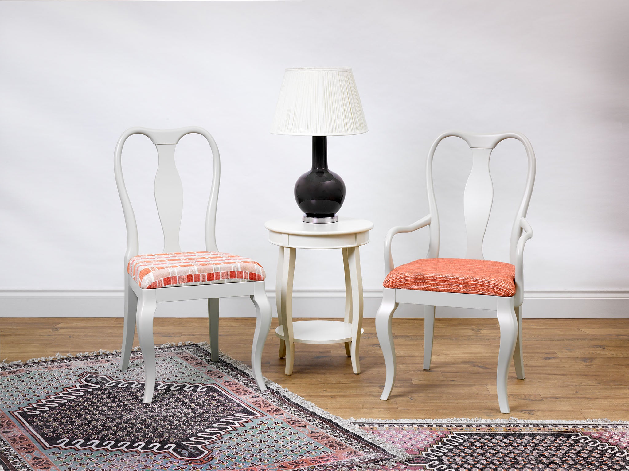 Marco Chair upholstered in Hippie in Coral from Christopher Farr Cloth